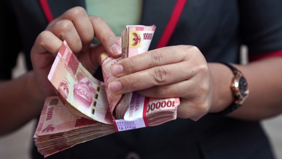 Ilustrasi Uang Rupiah (Dimas Ardian/Bloomberg)