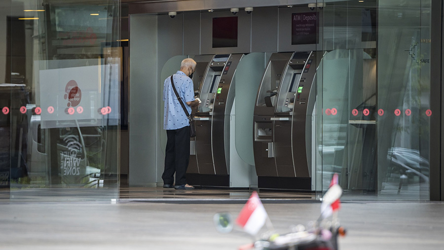 Ilustrasi ATM . (Edwin Koo/Bloomberg)