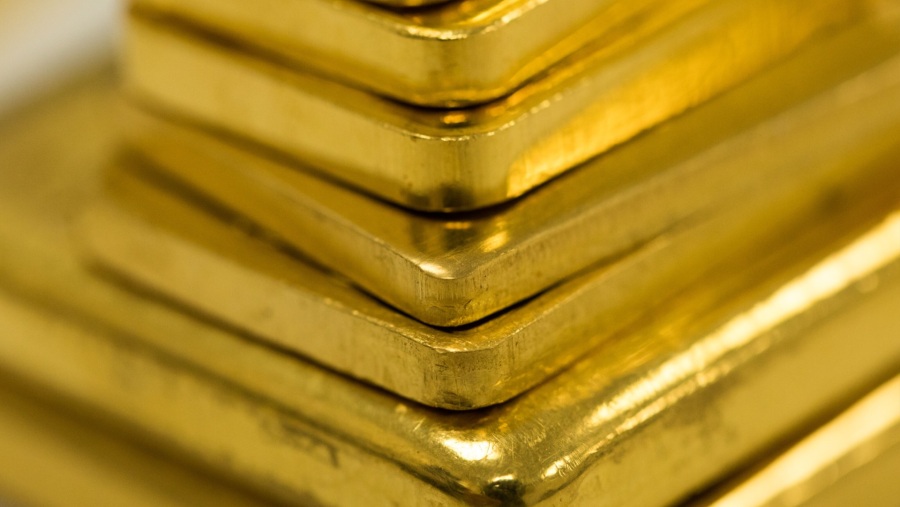 Tumupakan emas batangan. (dok Bloomberg)