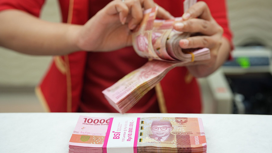 Rupiah mencetak pekan gemilang didukung aliran masuk modal asing yang semakin besar (Dimas Ardian/Bloomberg)