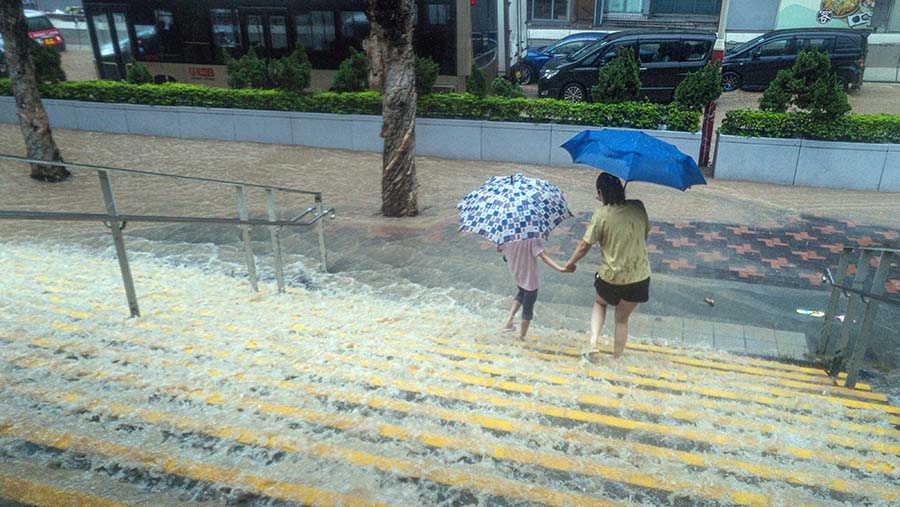 Ilustrasi Hujan. (Lam Yik/Bloomberg)