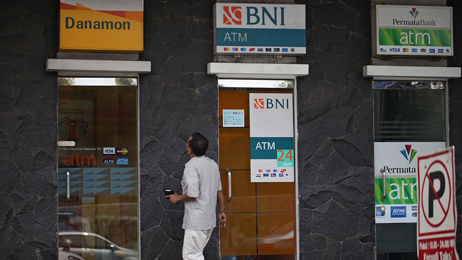 Ilustrasi ATM Bank. (Dimas Ardian/Bloomberg)