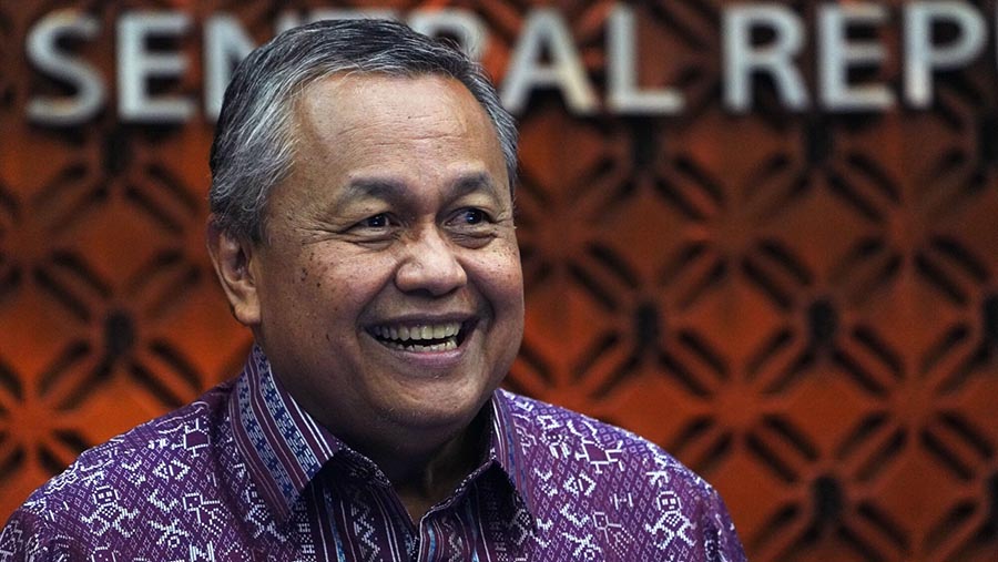 Gubernur Bank Indonesia, Perry Warjiyo mengumumkan Hasil Rapat Dewan Gubernur Bulan Mei 2024 di Jakarta, Rabu (22/5/2024). (Dimas Ardian/Bloomberg)
