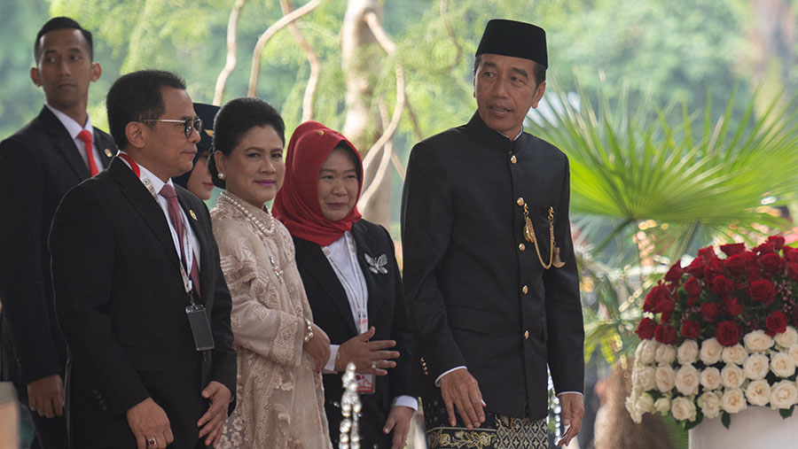 Presiden Jokowi tiba untuk mengikutisidang tahunan MPR dan Pidato Kenegaraan di DPR, Jumat (16/8/2024).(Rosa Panggabean/Bloomberg)