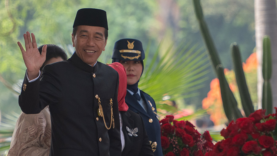 Presiden Jokowi tiba untuk mengikutisidang tahunan MPR dan Pidato Kenegaraan di DPR, Jumat (16/8/2024).(Rosa Panggabean/Bloomberg)