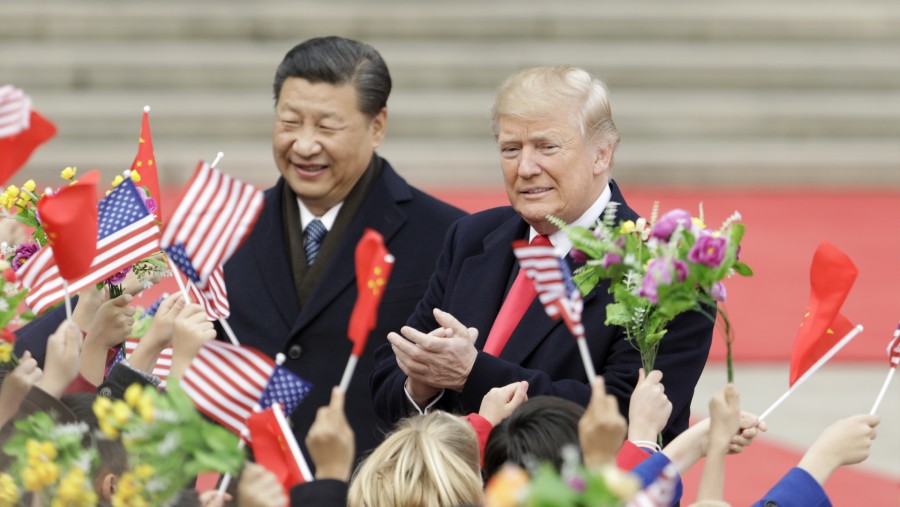 Xi Jinping bersama Donald Trump. (Sumber: Bloomberg)