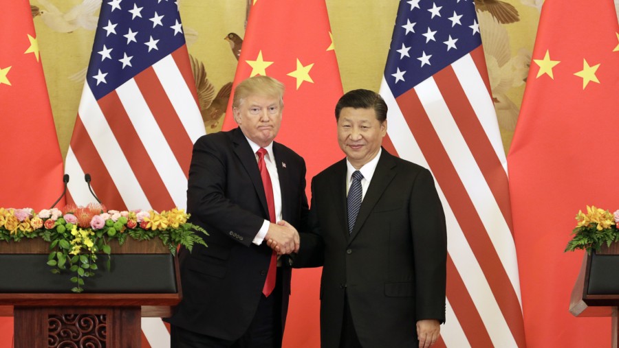 Donald Trump dan Xi Jinping./Bloomberg-Qilai Shen