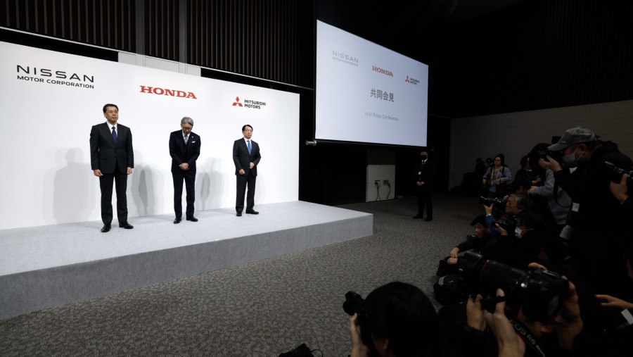 Kesepakatan rencana merger Honda-Nissan-Mitsubishi. (Kiyoshi Ota/Bloomberg)