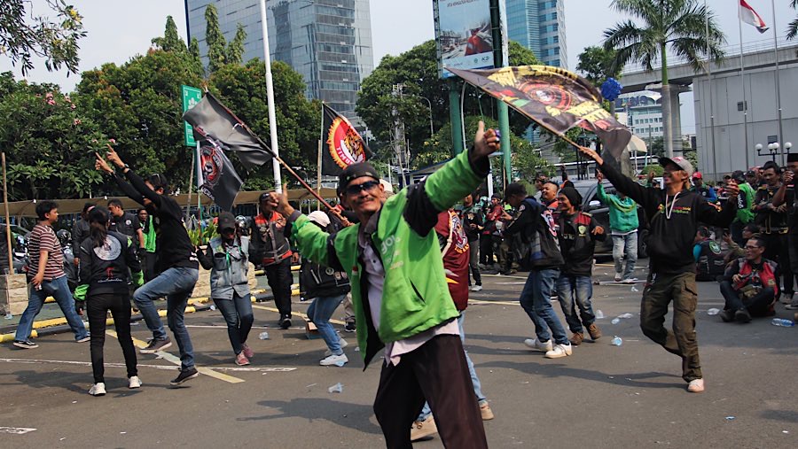 Mereka meminta Kemenaker bertanggung jawab atas dampak BHR yang merugikan mitra driver. (Bloomberg Technoz/Andrean Kristianto)