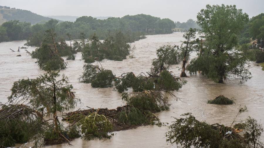 Banjir di sepanjang Sungai Guadalupe di Kerrville, Texas, pada tanggal 4 Juli. (Fotografer: Eric Vryn/Getty Images North America)