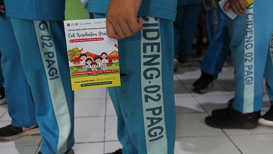 Sejumlah siswa terlihat antusias dengan adanya program cek kesehatan gratis (CKG) ini. (Bloomberg Technoz/Andrean Kristianto)