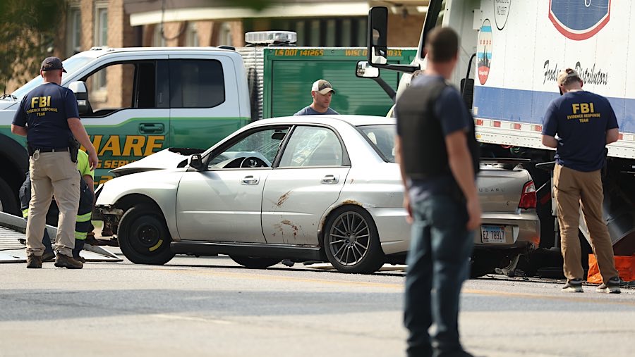 Ia ditembak saat berusaha melarikan diri dengan mobil dan menyeret seorang petugas yang berupaya menangkapnya. (Talia Sprague/Bloomberg)