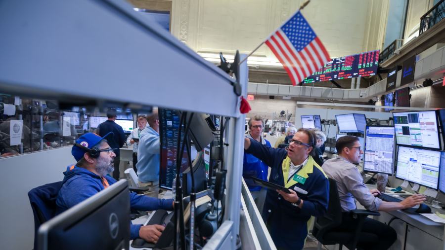 Reaksi pasar saham di Amerika usai Fed turunkan tingkat bunga. (Bloomberg)