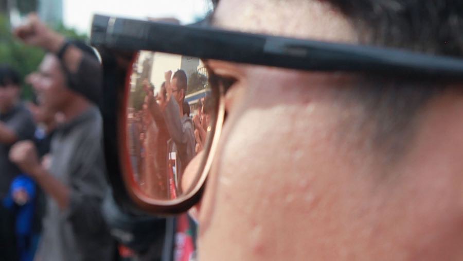 Aksi ini digelar menjelang evaluasi satu tahun pemerintahan Prabowo-Gibran. (Bloomberg Technoz/Andrean Kristianto)