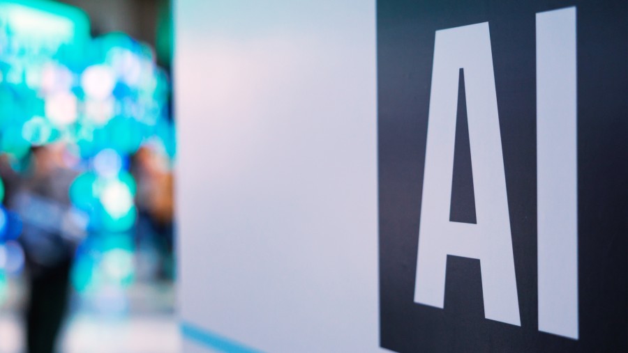 Papan informasi kecerdasan buatan di SK AI Summit di Seoul, Korea Selatan, November 2025. SeongJoon Cho/Bloomberg