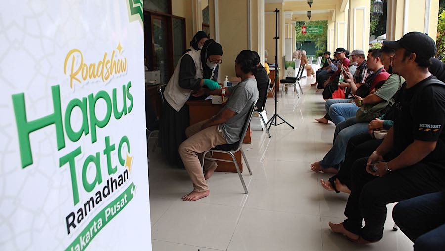 Layanan hapus tato gratis ini digelar di beberapa titik strategis di Jakarta. (Bloomberg Technoz/Andrean Kristianto)