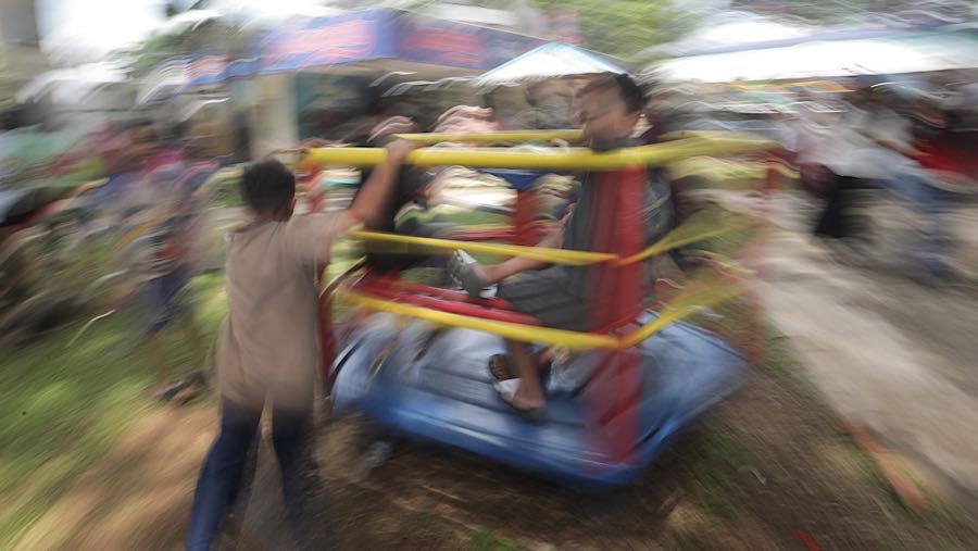 Sejumlah anak bermain di Taman Woody, Depok, Jawa Barat, Senin (23/3/2026). (Bloomberg Technoz/Andrean Kristianto)