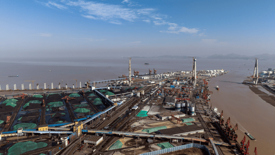 Stockpiles of coal at a sorting and storage facility./Bloomberg